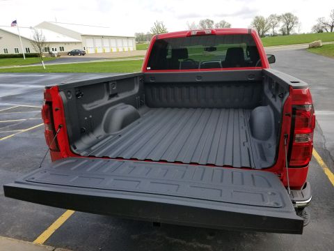 Sprayed-on protective bed liner finish
