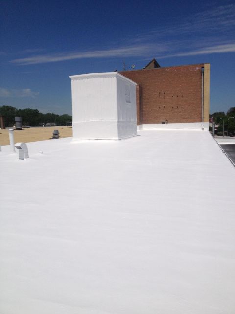 Foam roof installation on a commercial building