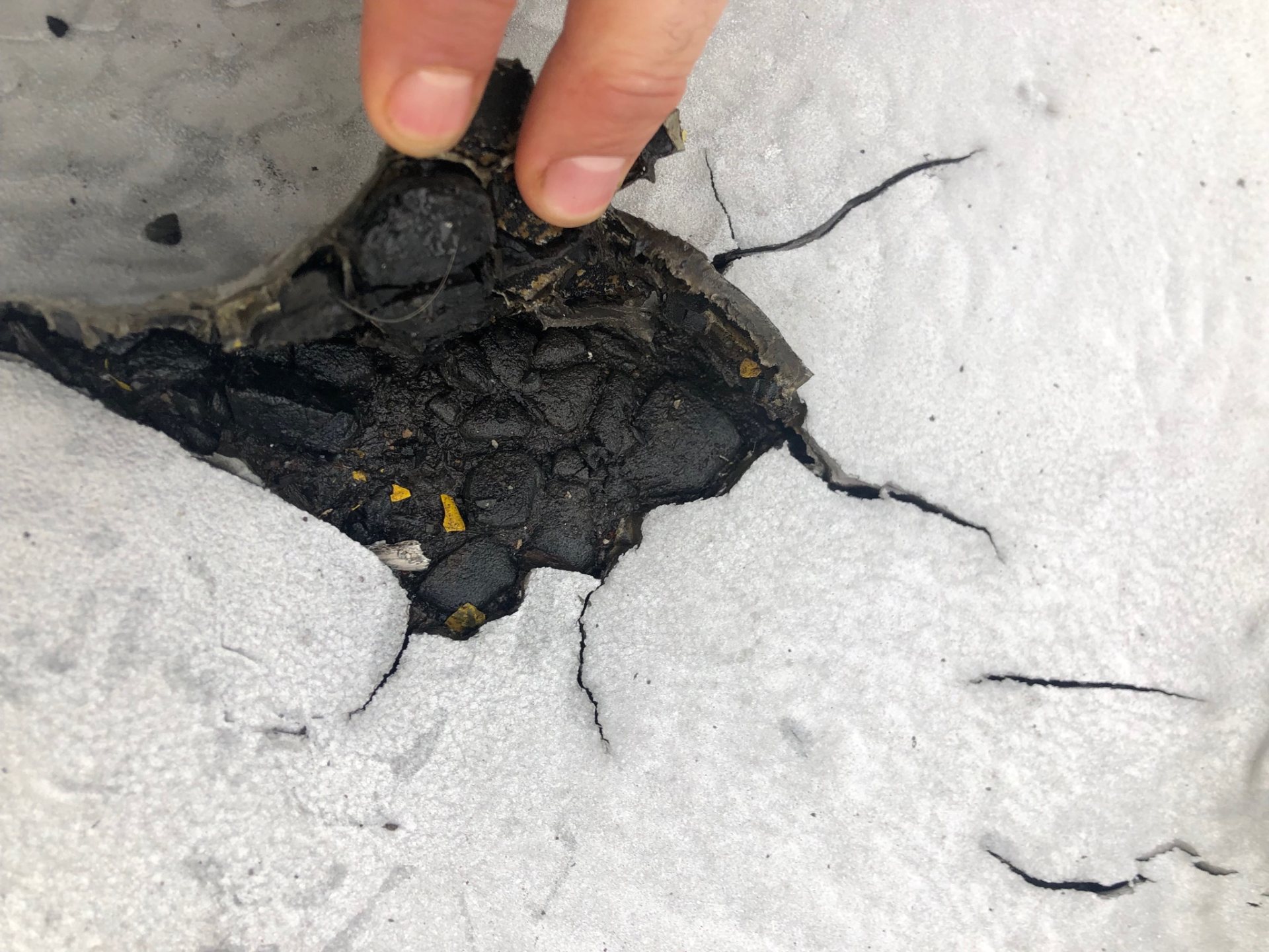 Polyurea protective coating applied over asphalt — seamless waterproof coating