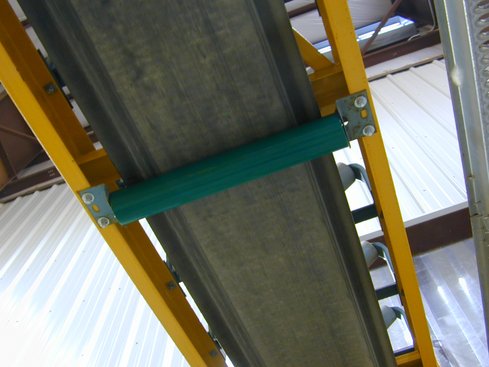 Conveyor system coated with polyurea protective coating — after project completion