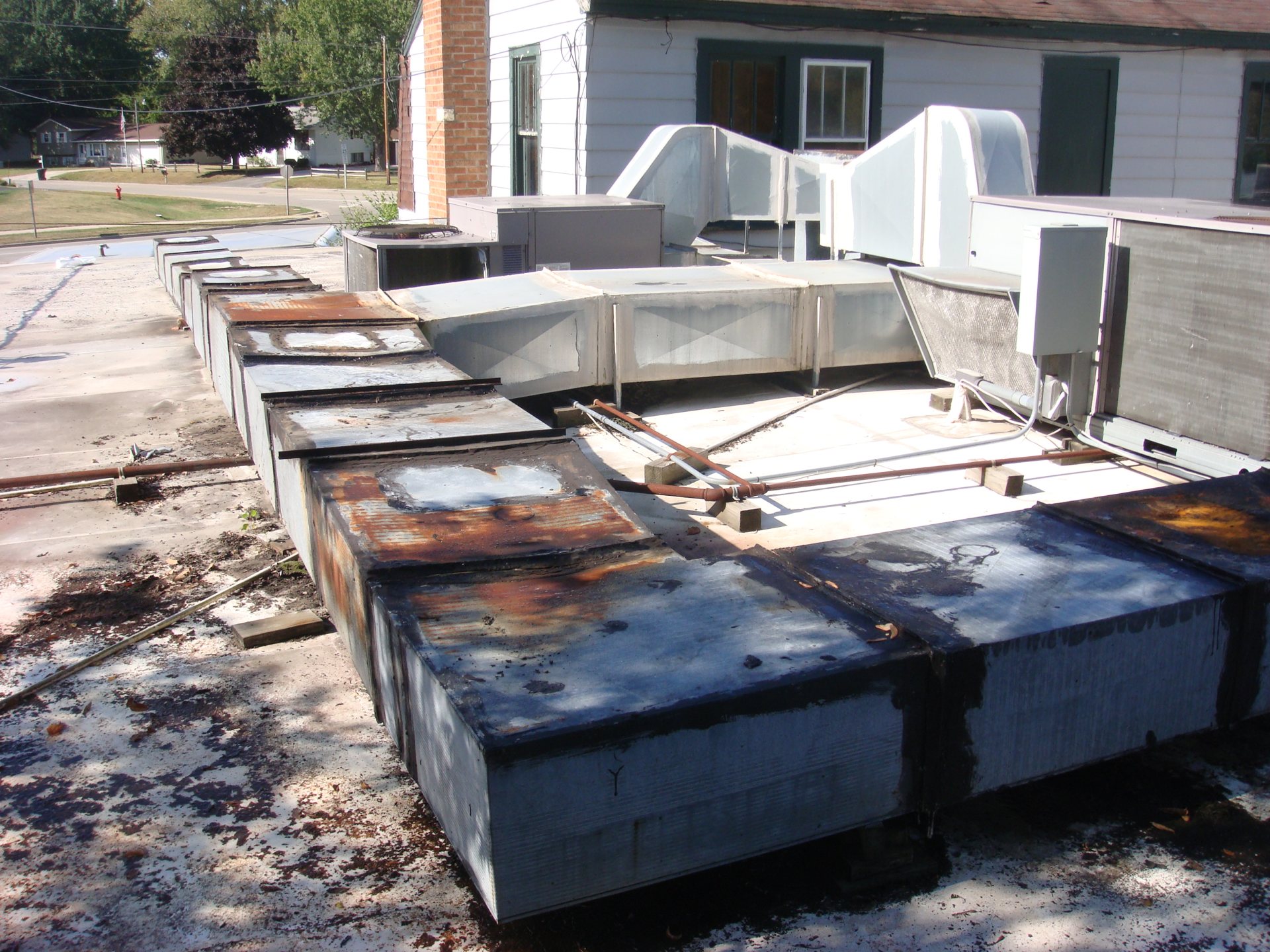 Why Roof Coatings Fail — and Why Pure Polyurea Doesn't