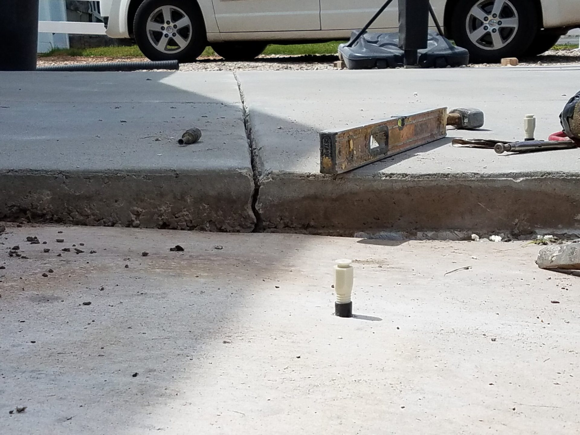 Sunken concrete slab before polyurethane foam lifting