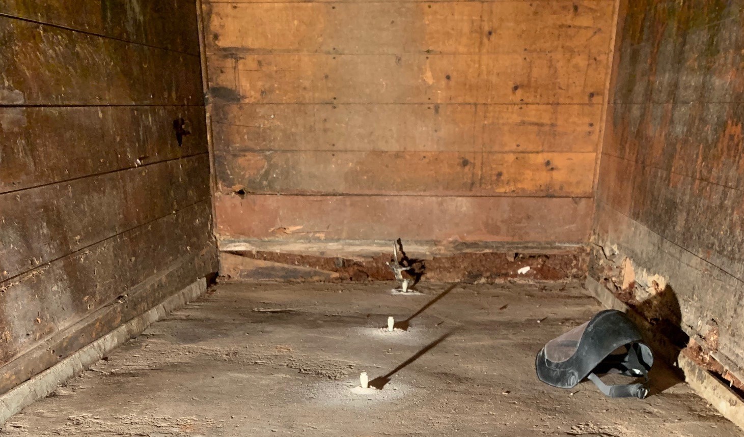 Settled concrete before foam slab jacking — trip hazard at panel joint