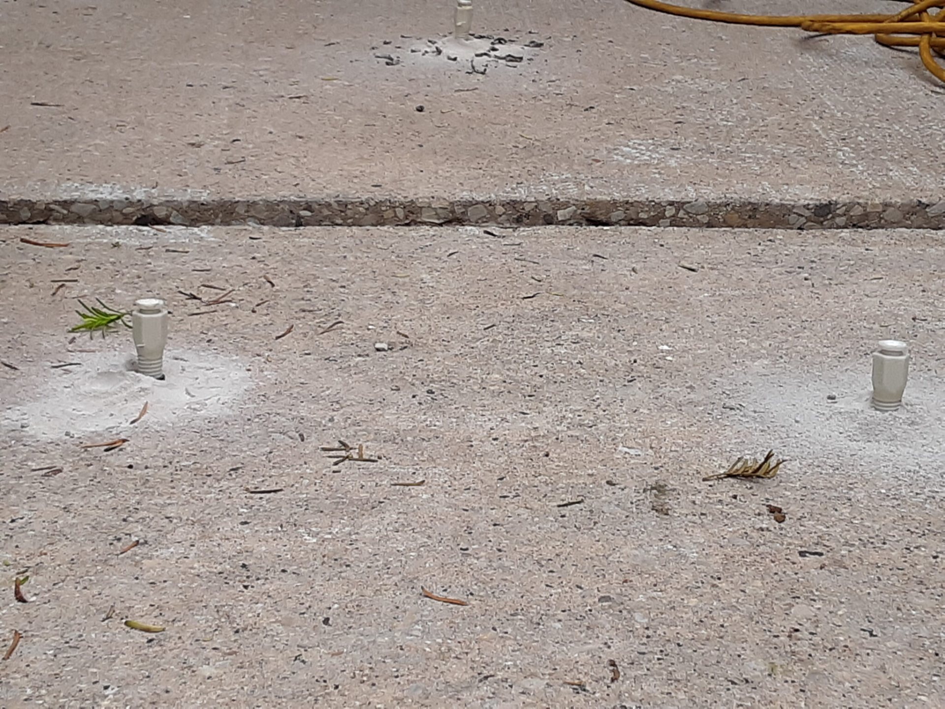 Oak Ridge 2.8 lb high-density polyurethane concrete lifting foam in use on settled slab project