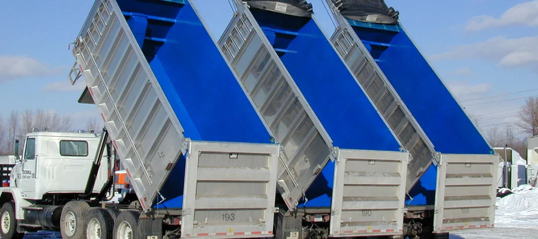 Heavy-duty polyurea dump truck liner for commercial fleet protection