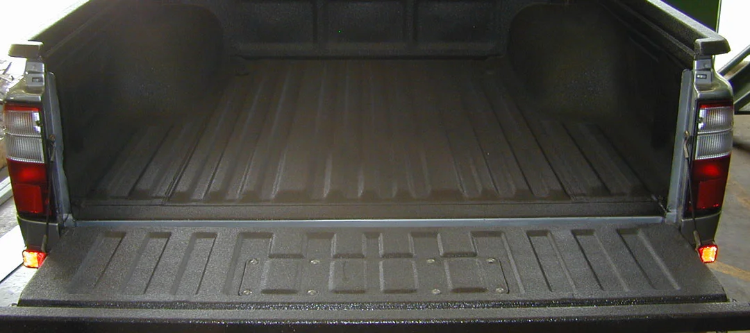 Spray-in polyurea truck bed liner application — ORBL system from Oak Ridge