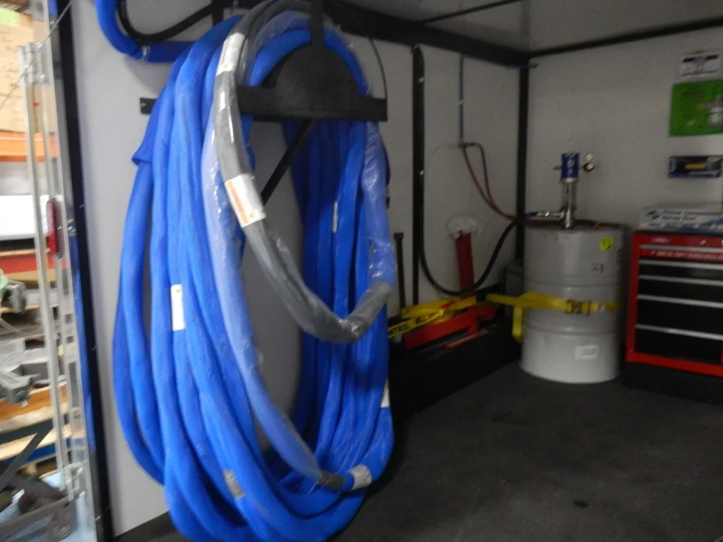 a blue hoses on a wall