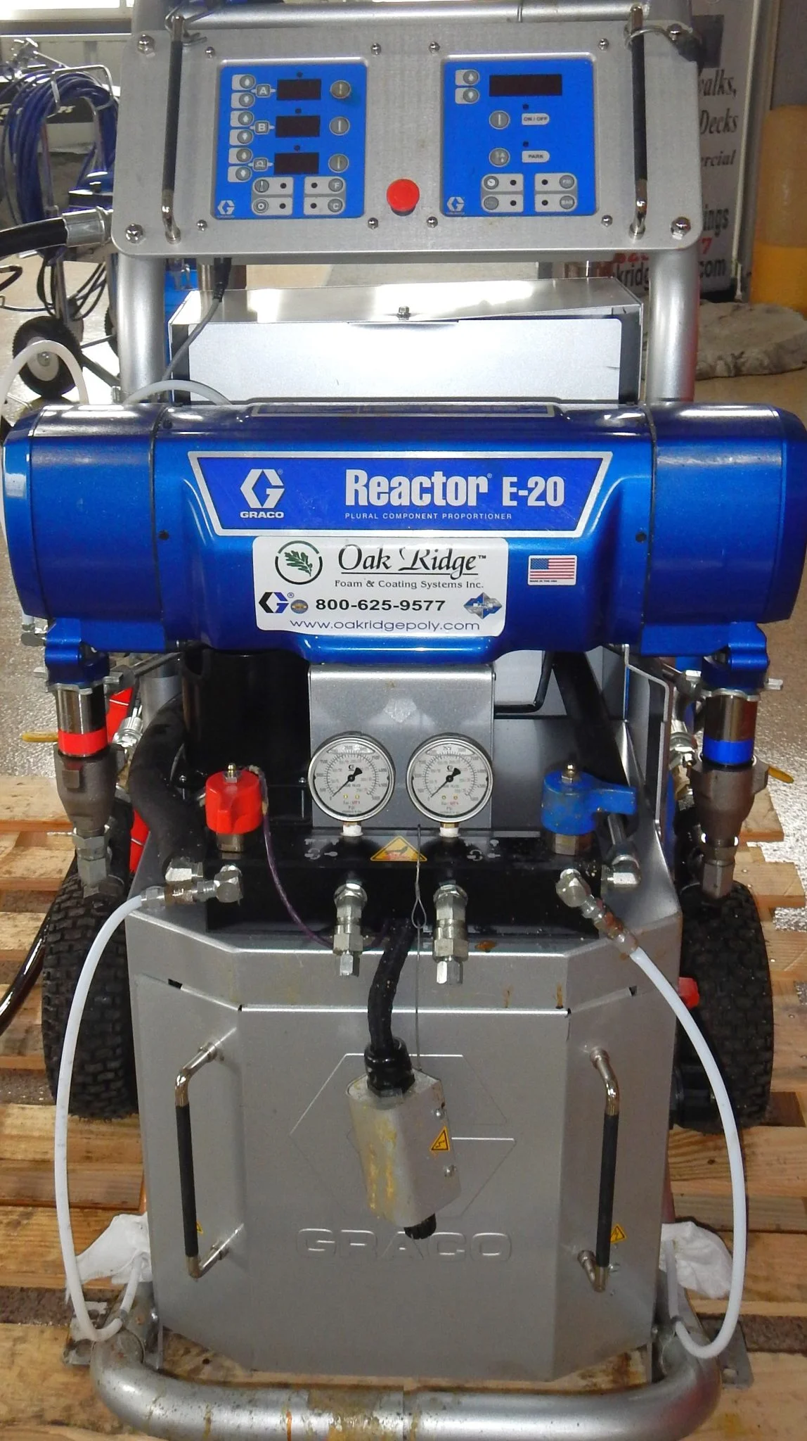 a blue machine on a pallet