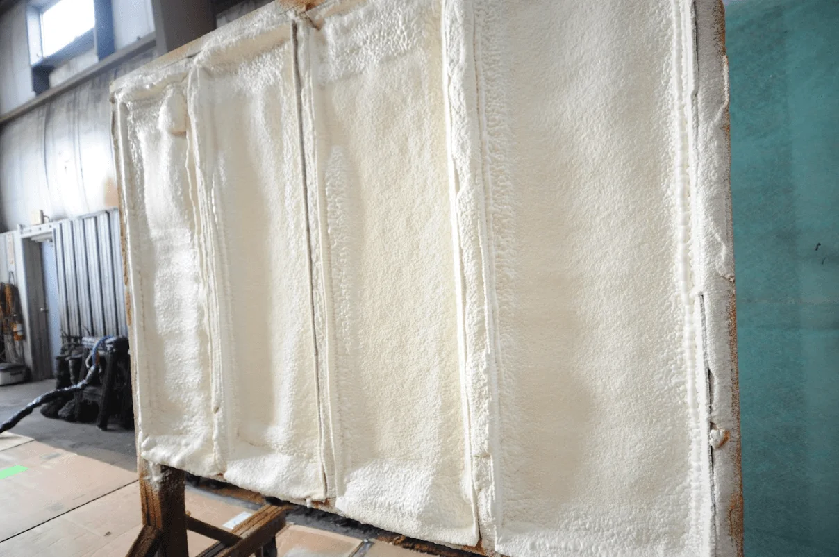 a white towel on a wooden surface