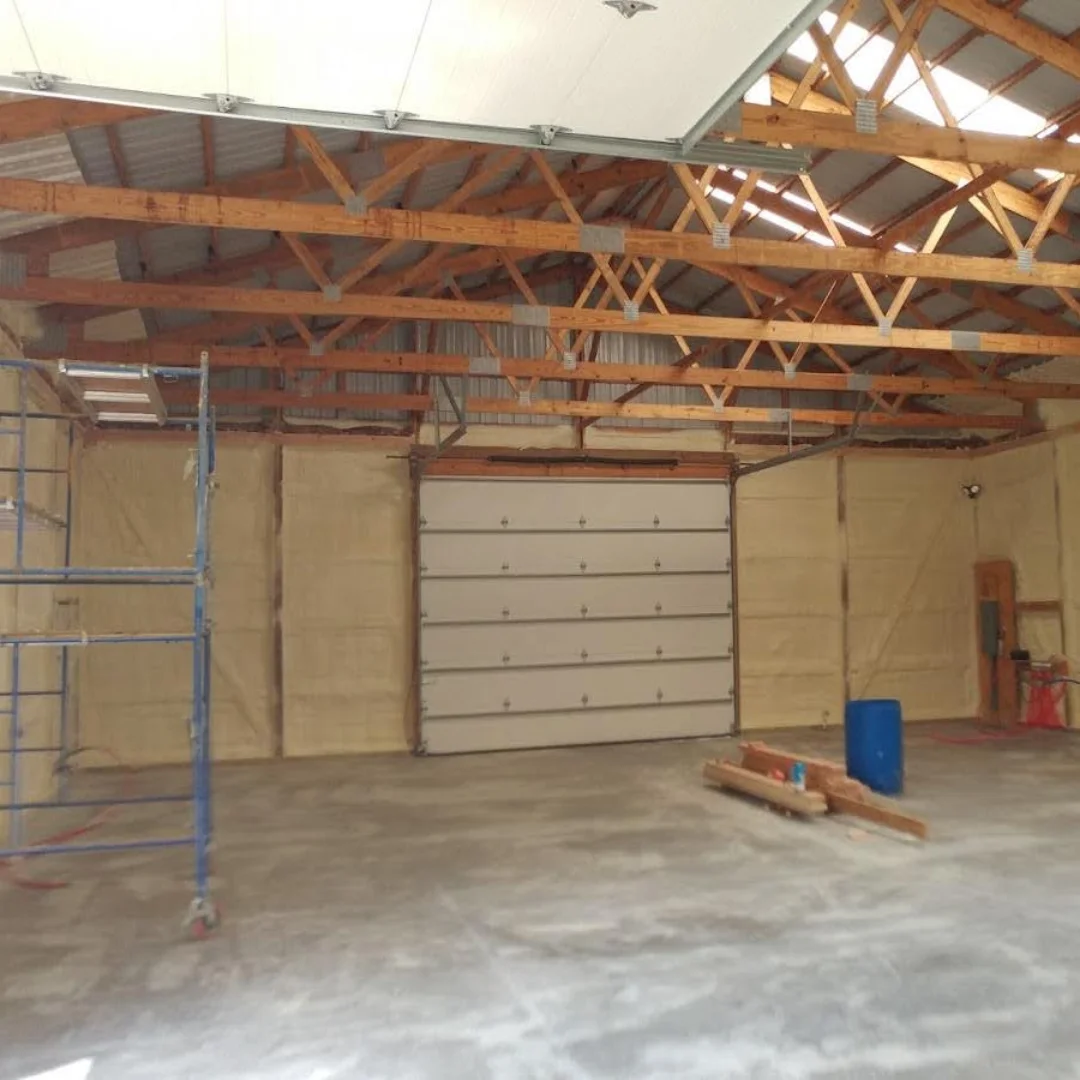 a room with a scaffolding and a ladder
