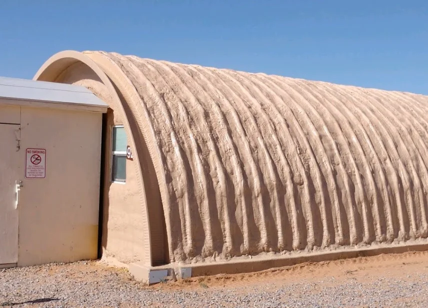 a small round building with a door
