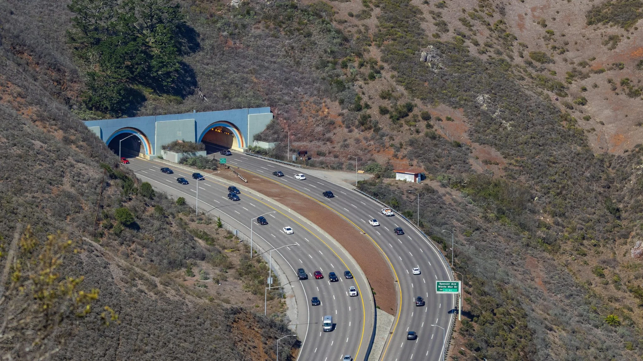 a highway with cars on the road