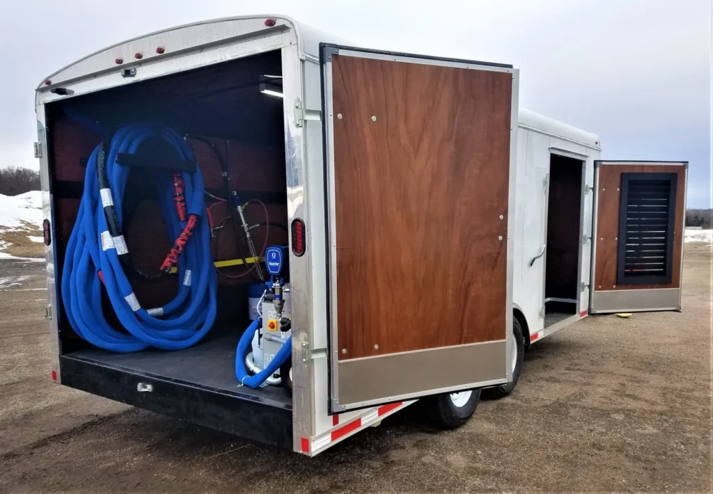 a trailer with a hose in the back